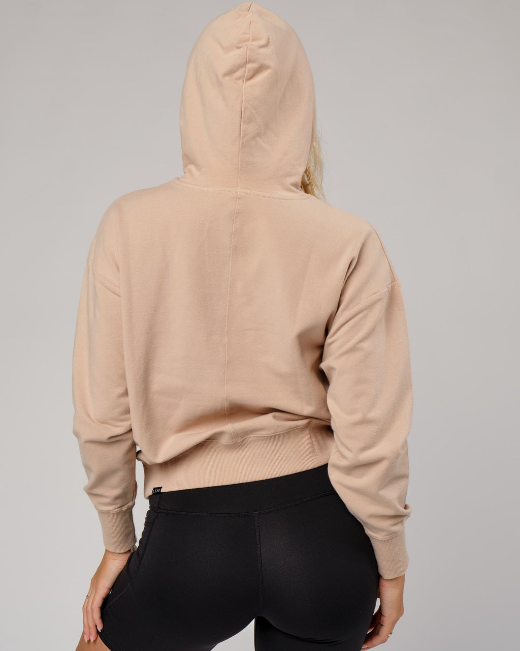 Model wearing Divide Hoodie - Nude