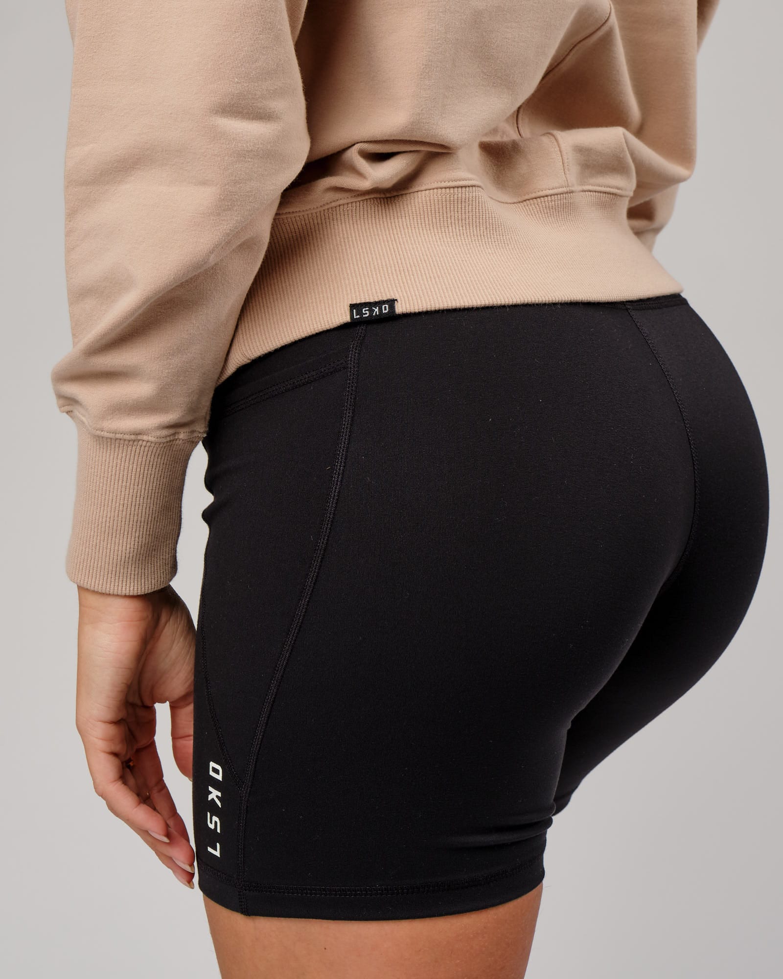 Model wearing Divide Hoodie - Nude