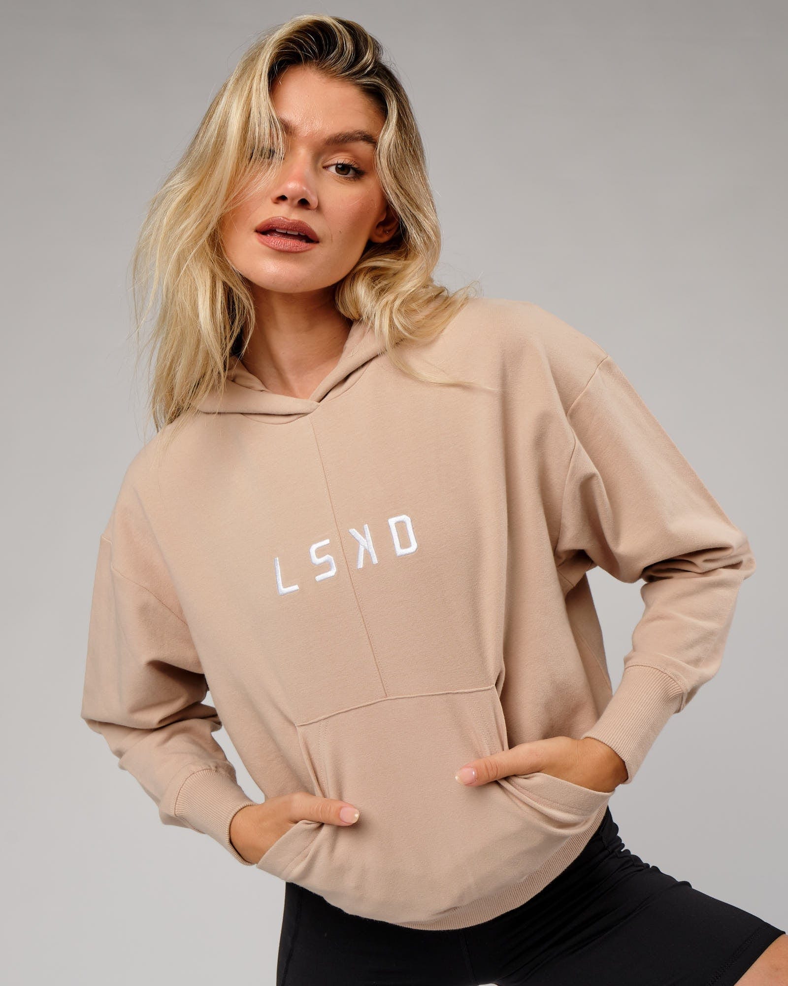 Model wearing Divide Hoodie - Nude