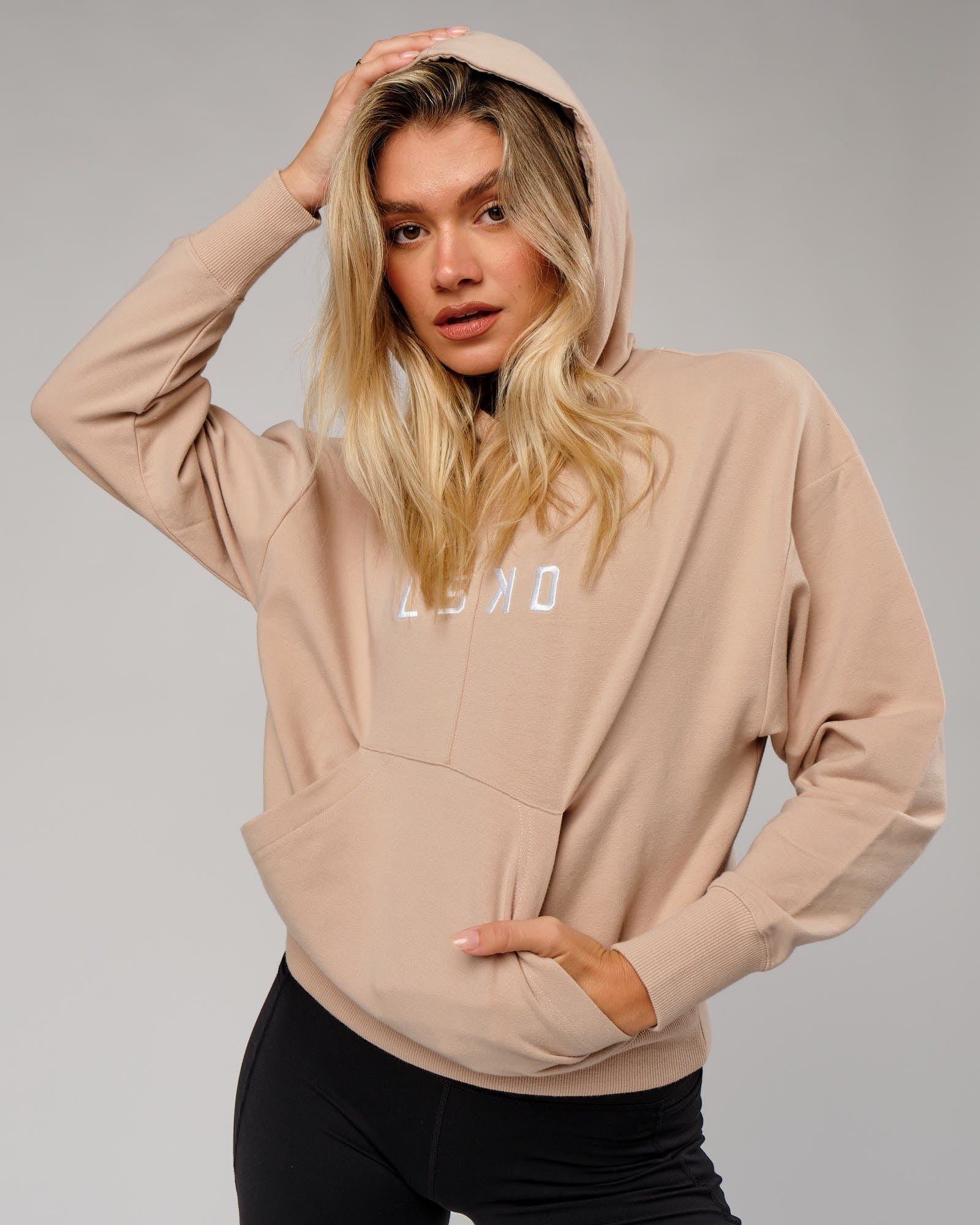 Model wearing Divide Hoodie - Nude