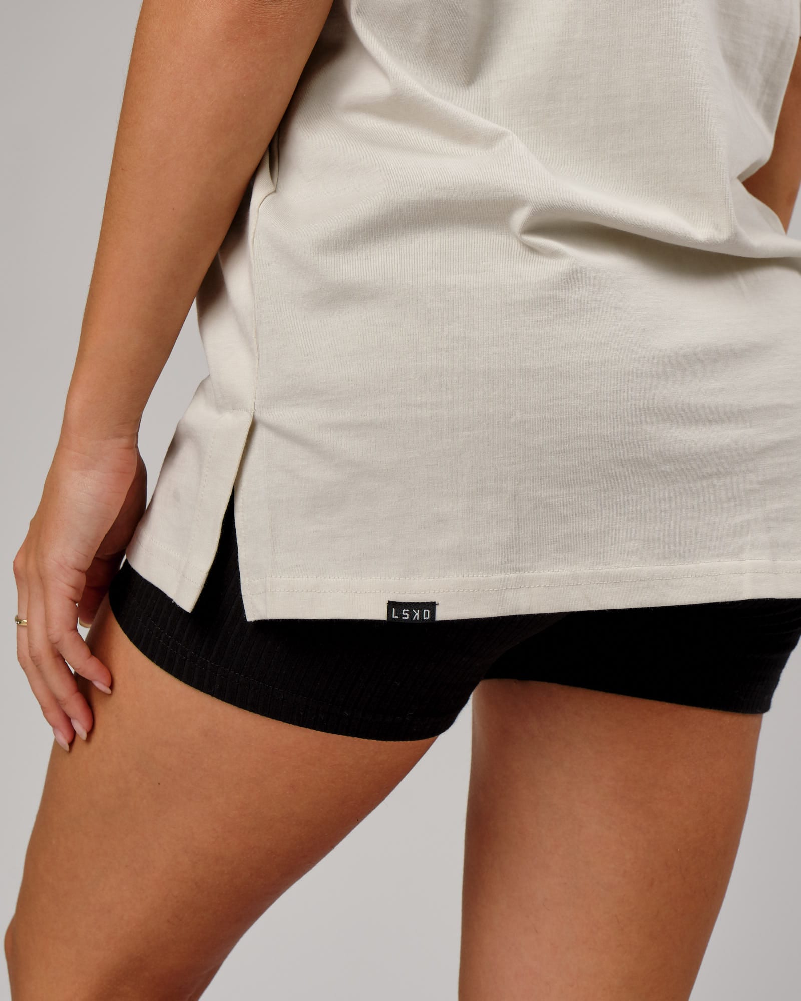 Model wearing Unisex Laps Tee Oversize - Bone