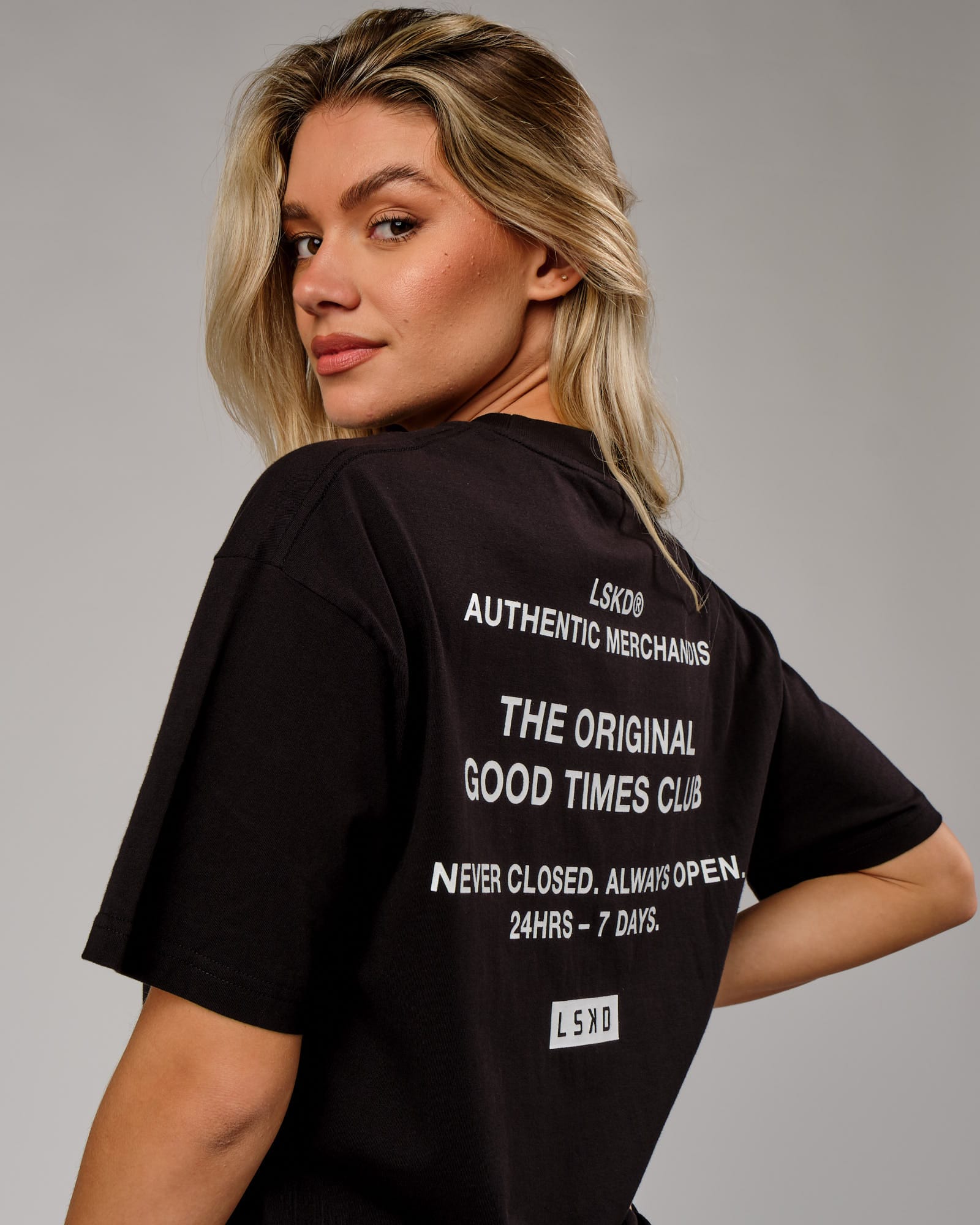 Model wearing Unisex OGTC Tee Oversize - Black