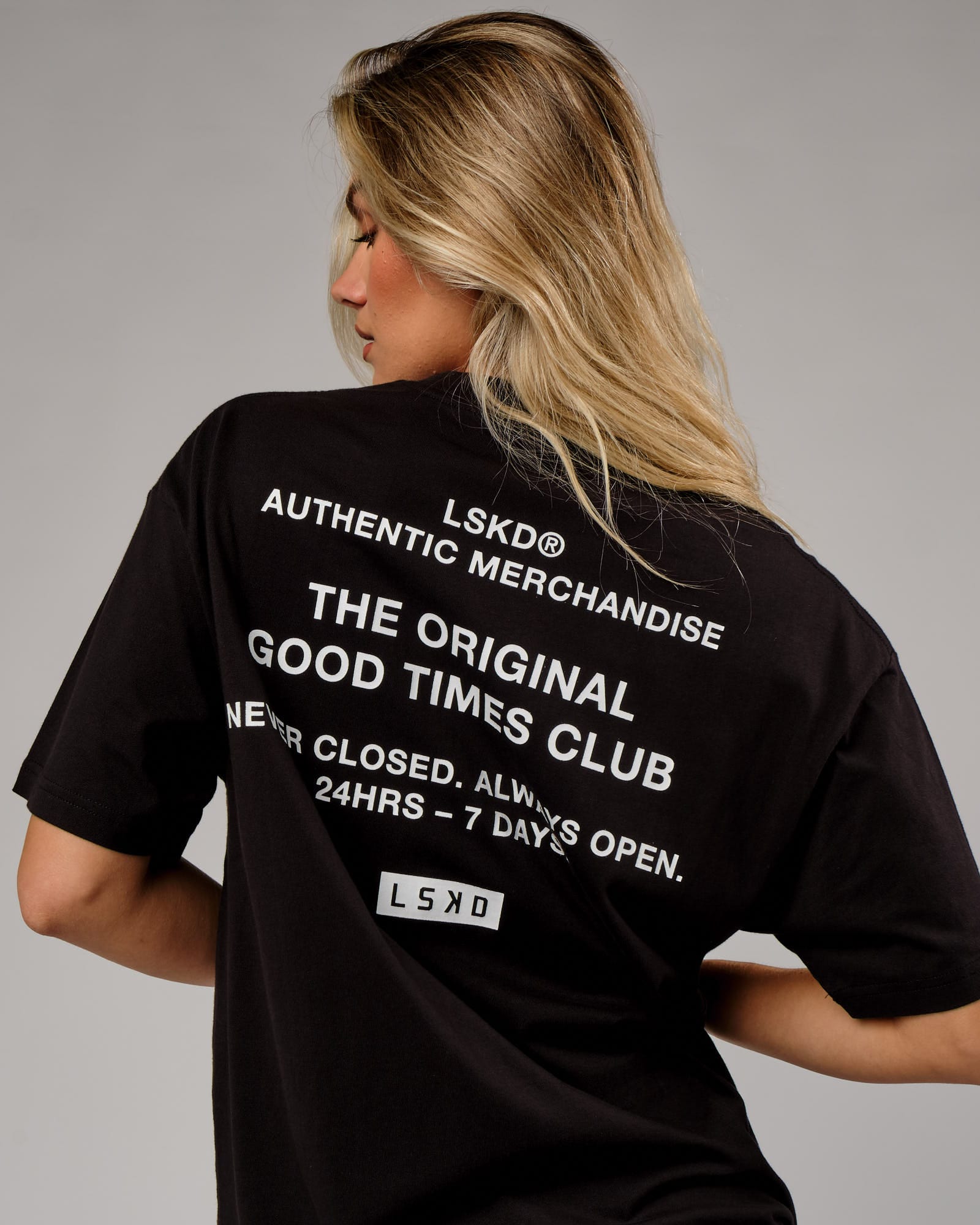 Model wearing Unisex OGTC Tee Oversize - Black