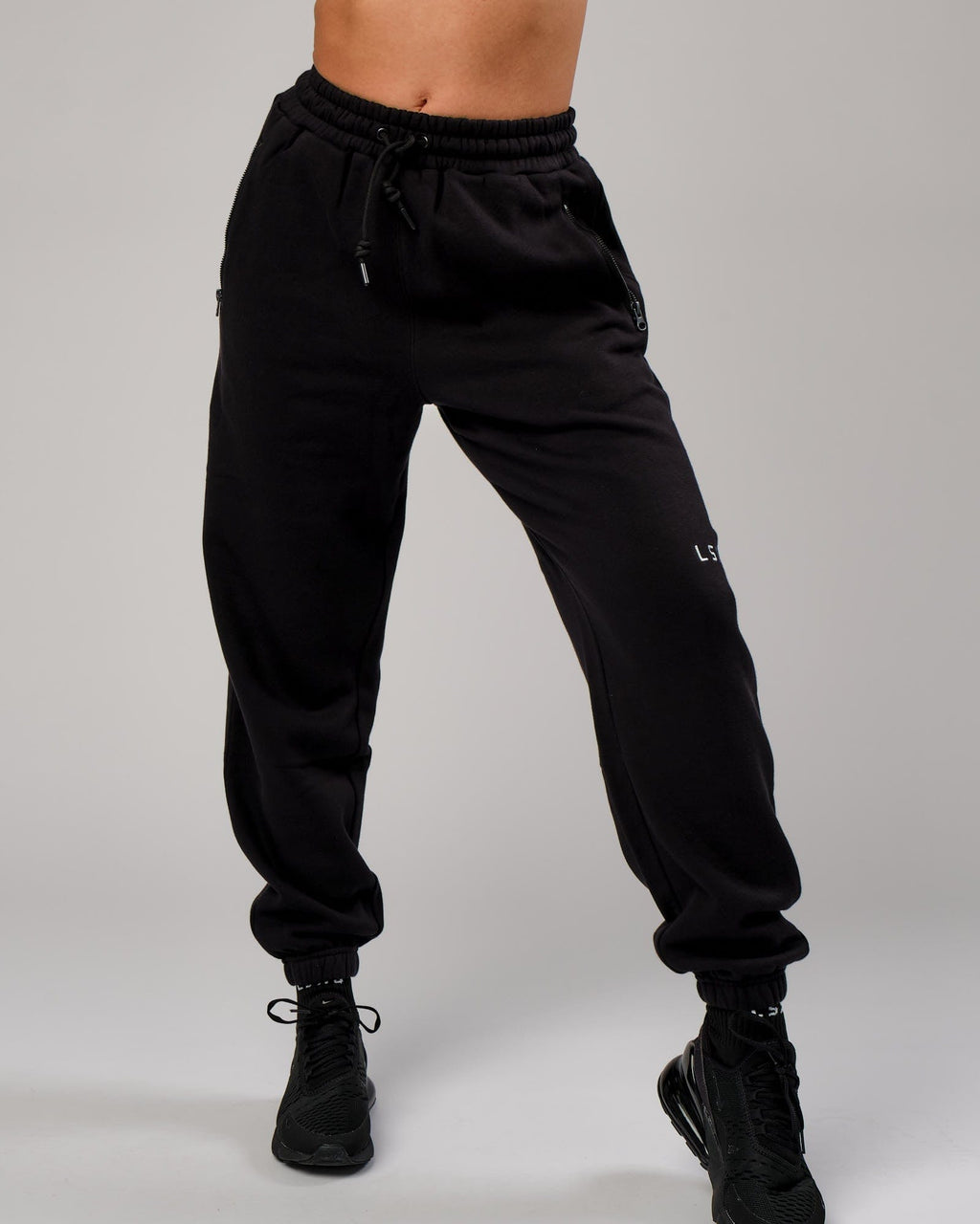 Model wearing Becca Track Pant - Black
