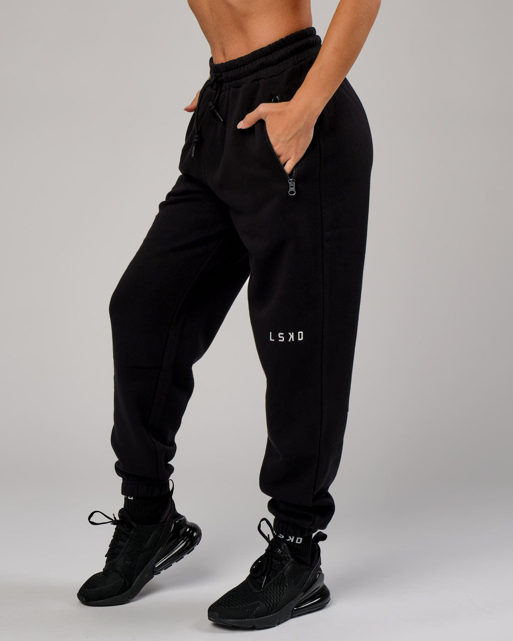 Model wearing Becca Track Pant - Black