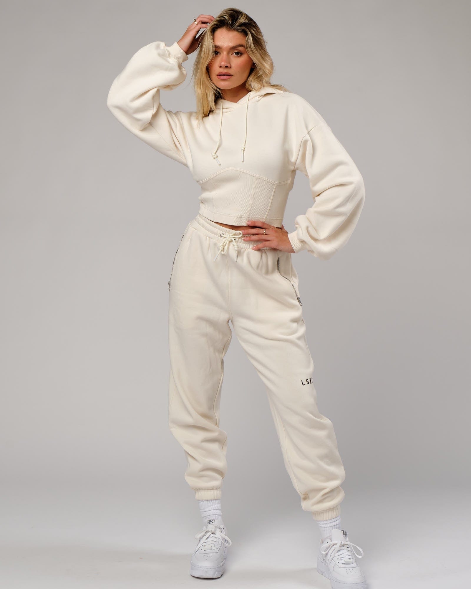 Model wearing Becca Corset Hoodie - Cream