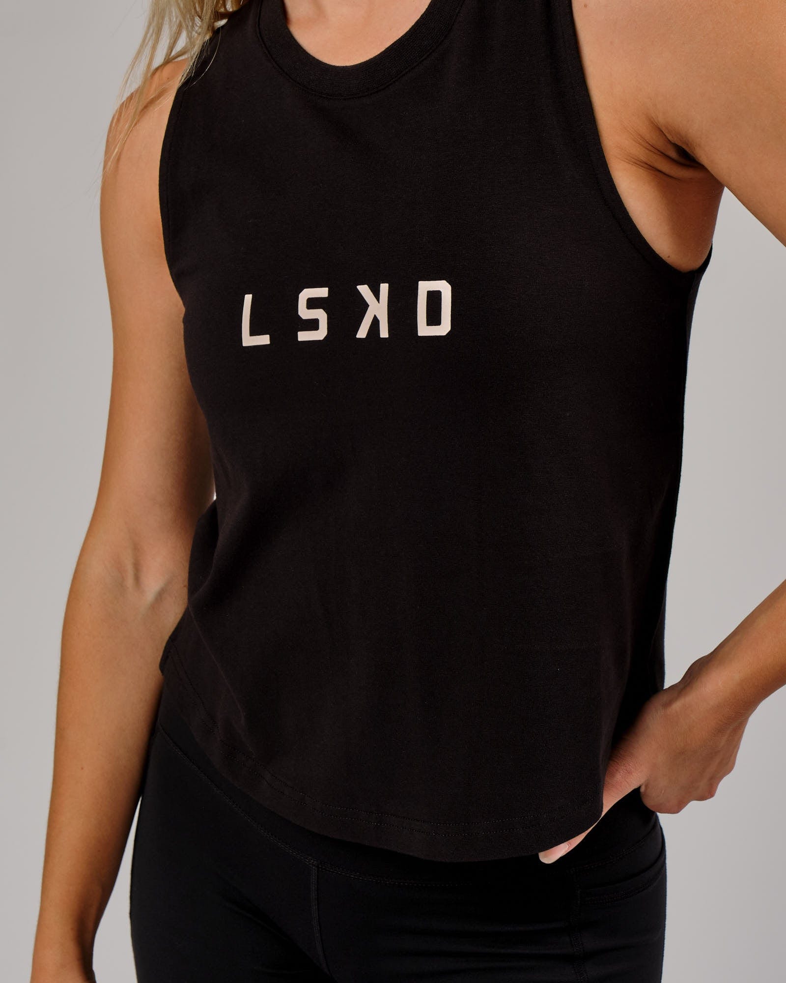 Model wearing Rep Tank - Black-Nude