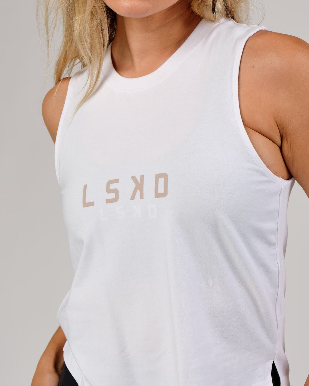 Model wearing Rep Tank - White-Nude