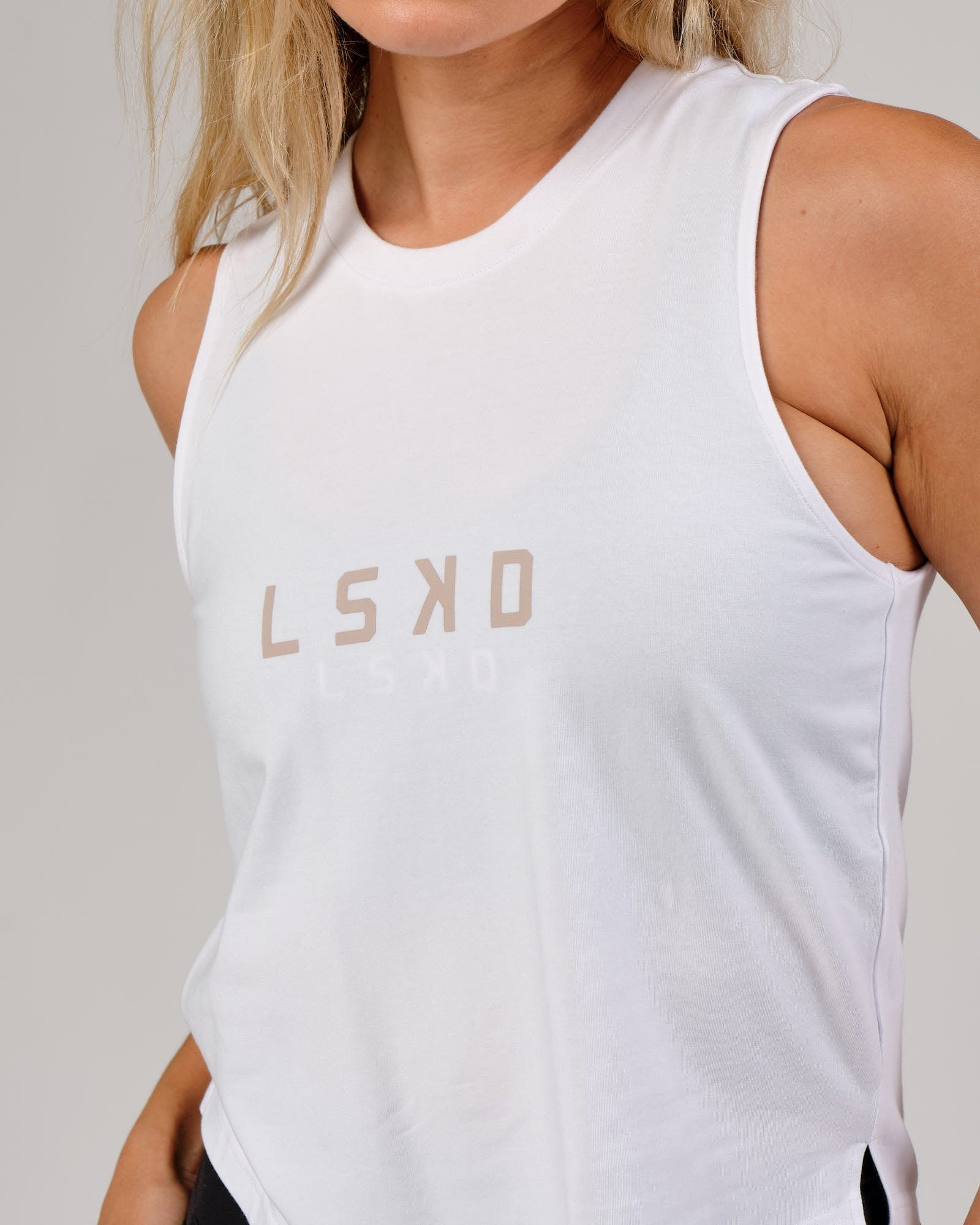 Model wearing Rep Tank - White-Nude