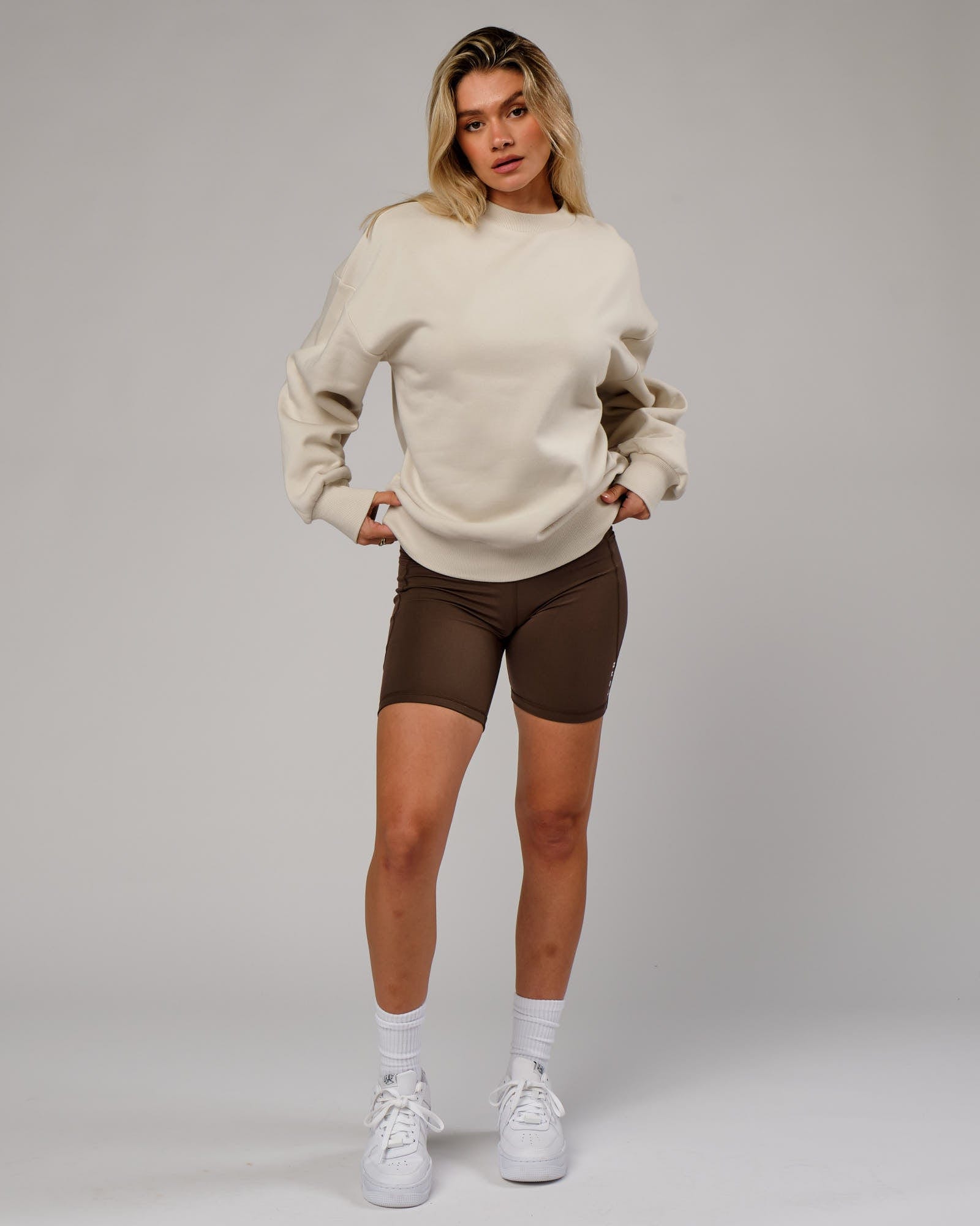 Model wearing Unisex OGTC Sweater Oversize - Bone