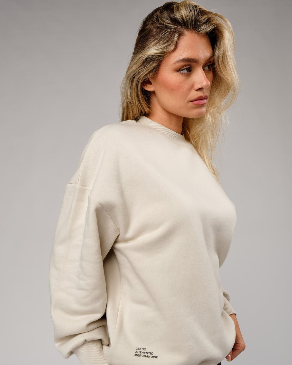 Model wearing Unisex OGTC Sweater Oversize - Bone