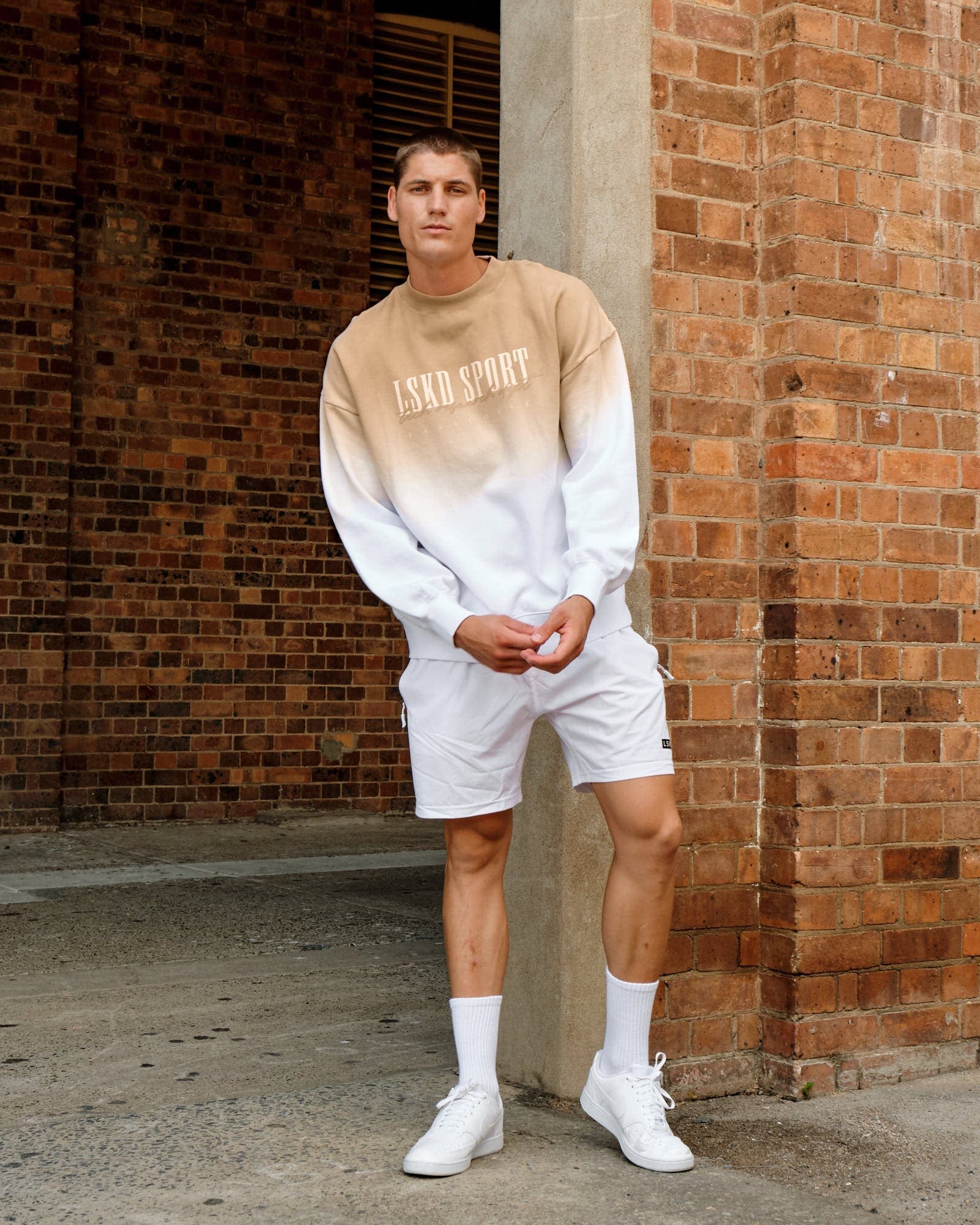 Model wearing Gradient Sweater - Nude-White