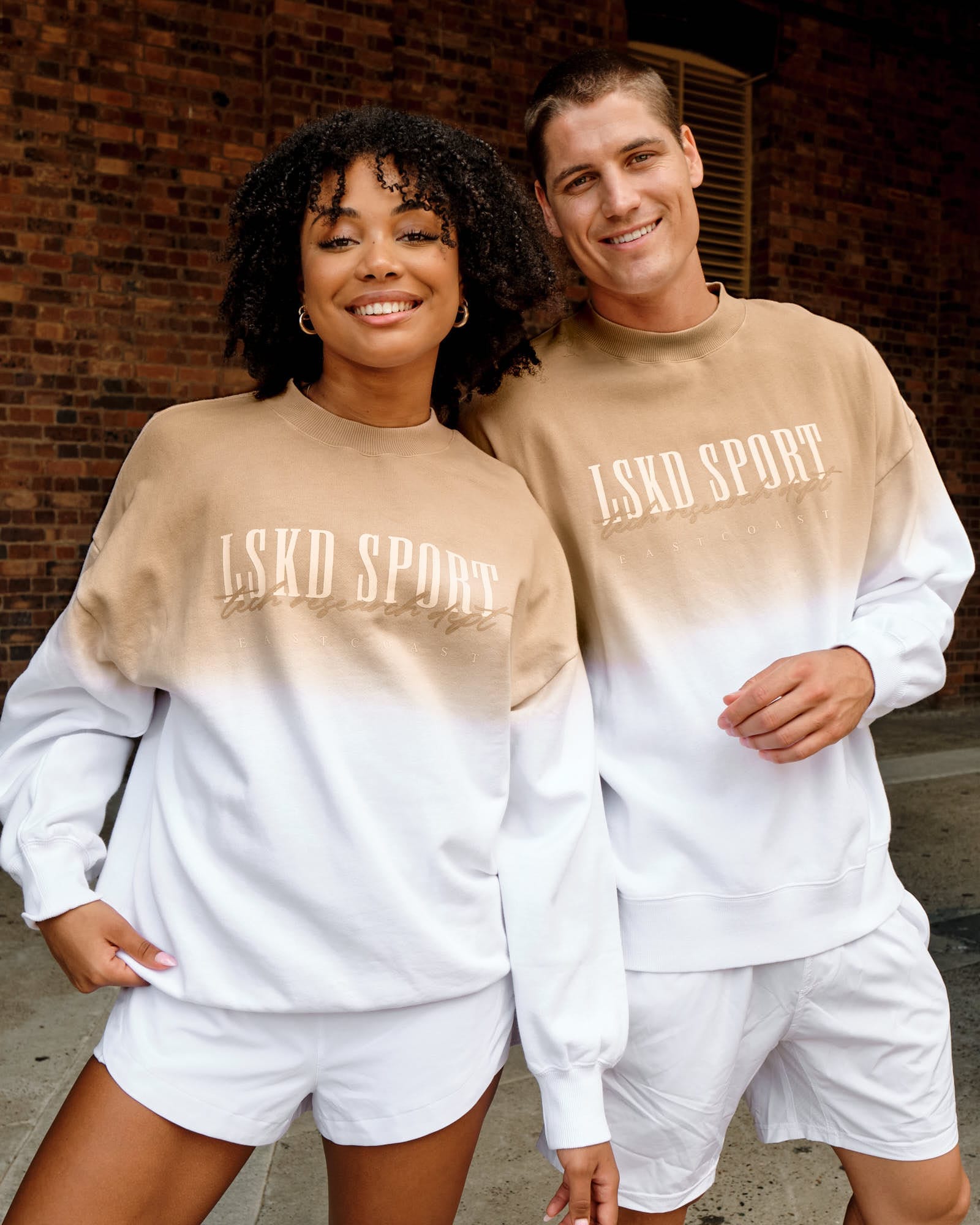 Model wearing Unisex Gradient Sweater - Nude-White