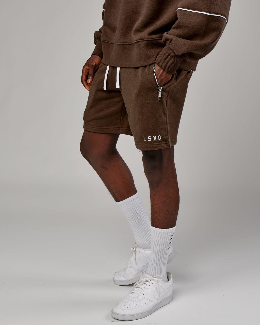 Model wearing Connor Track Short - Walnut