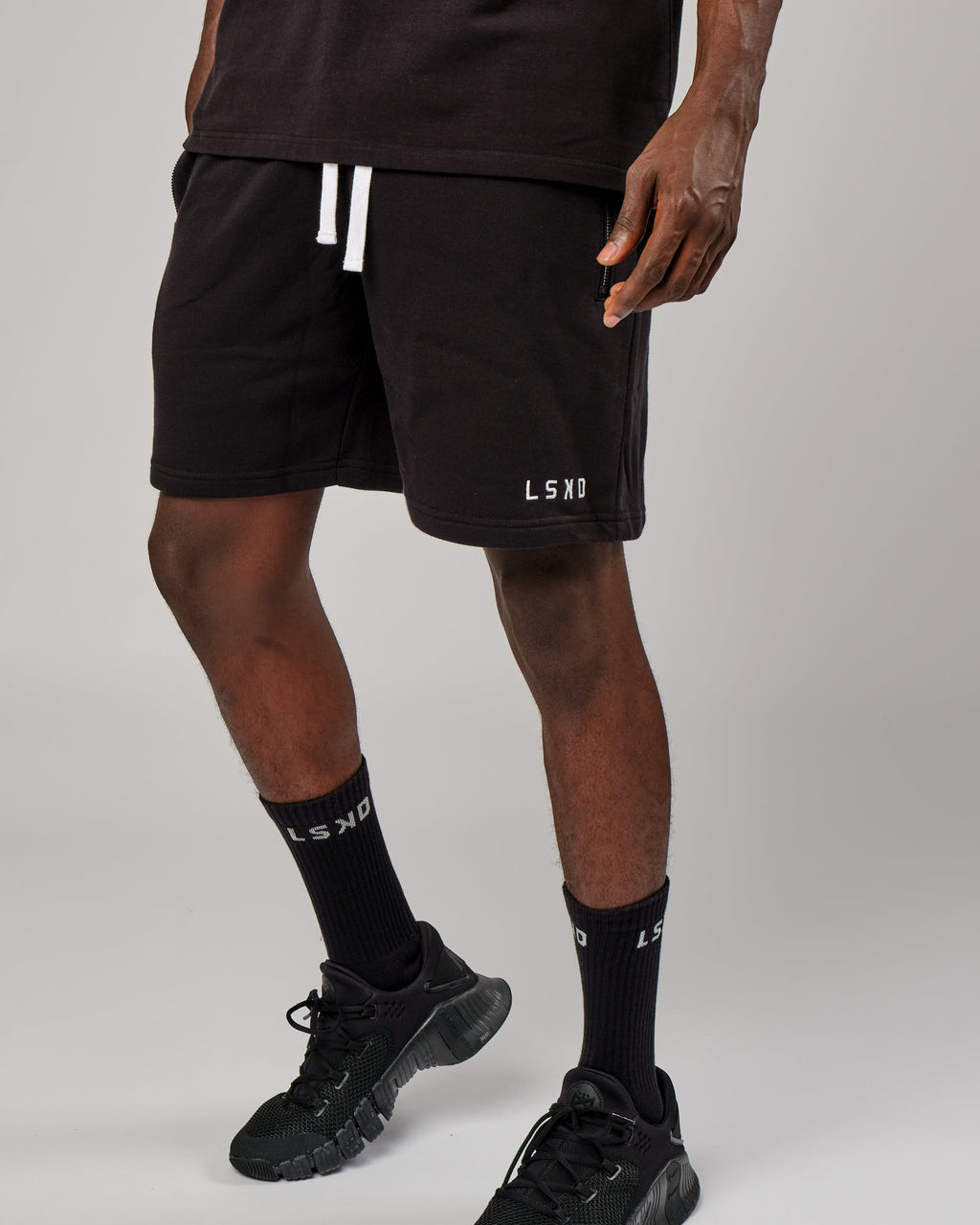 Model wearing Connor Track Short - Black