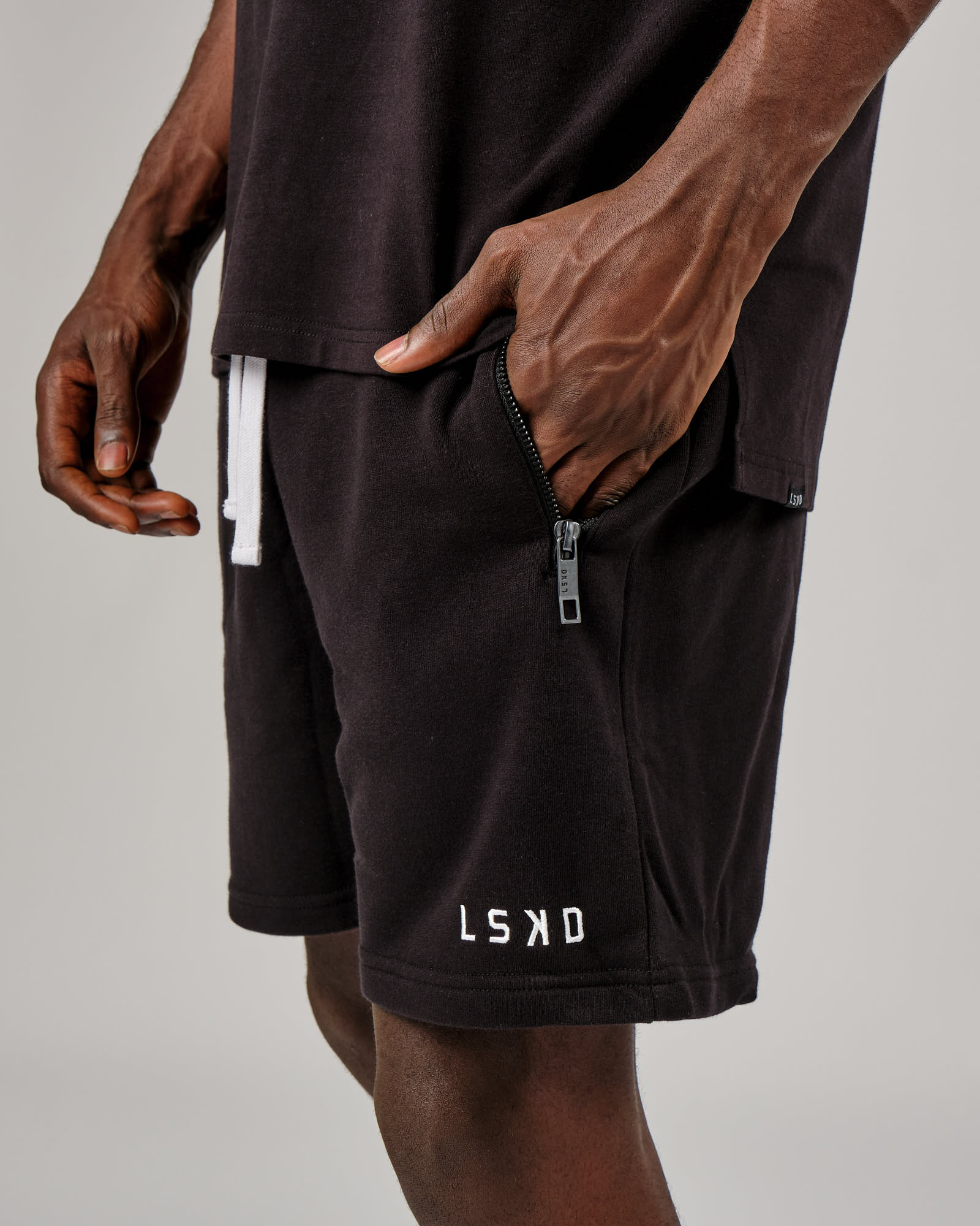 Model wearing Connor Track Short - Black