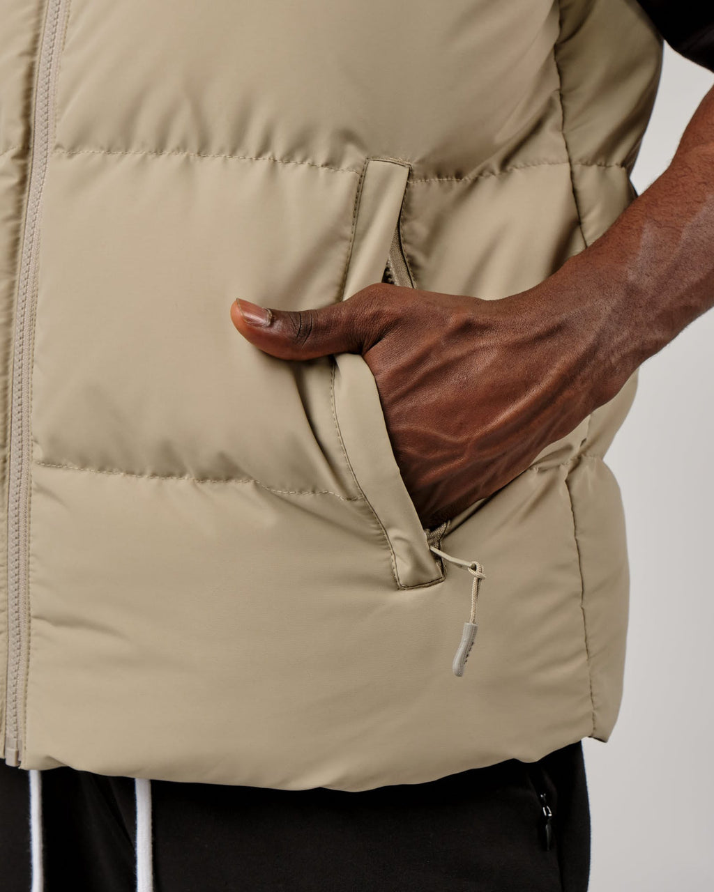 Model wearing Essential Puffer Vest - Laurel Oak