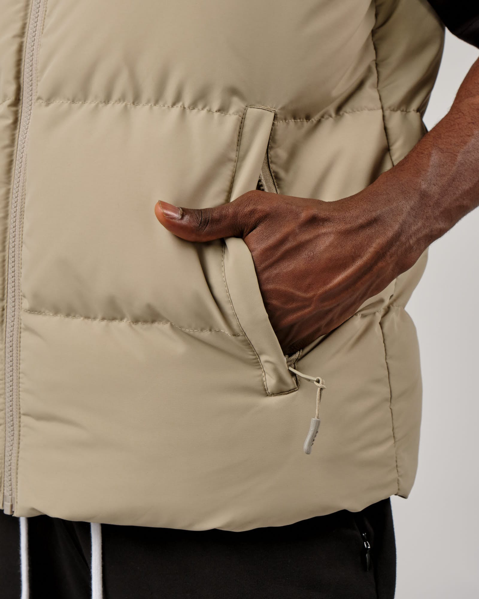 Model wearing Essential Puffer Vest - Laurel Oak