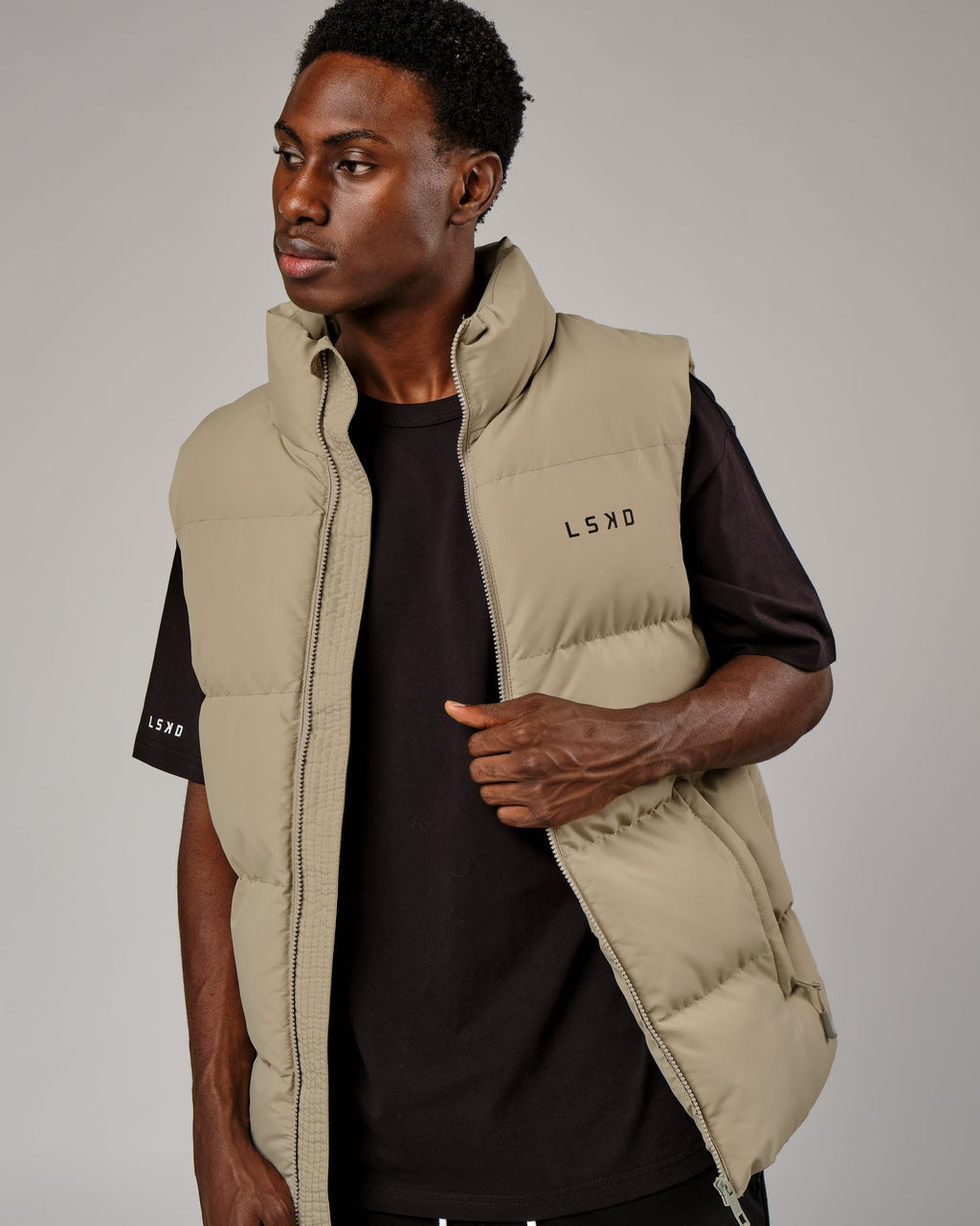 Model wearing Essential Puffer Vest - Laurel Oak