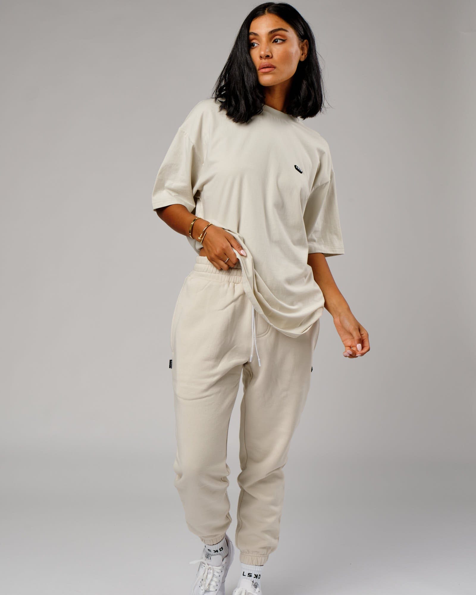 Model wearing Unisex Capsule Tee Oversize - Bone