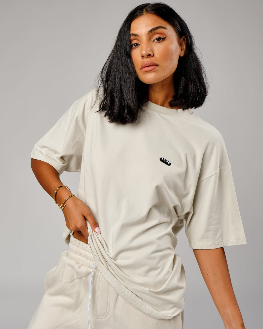 Model wearing Unisex Capsule Tee Oversize - Bone