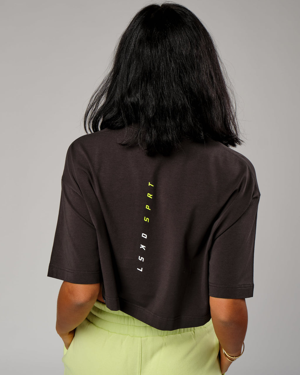 Model wearing Tilt Cropped Tee - Pirate Black