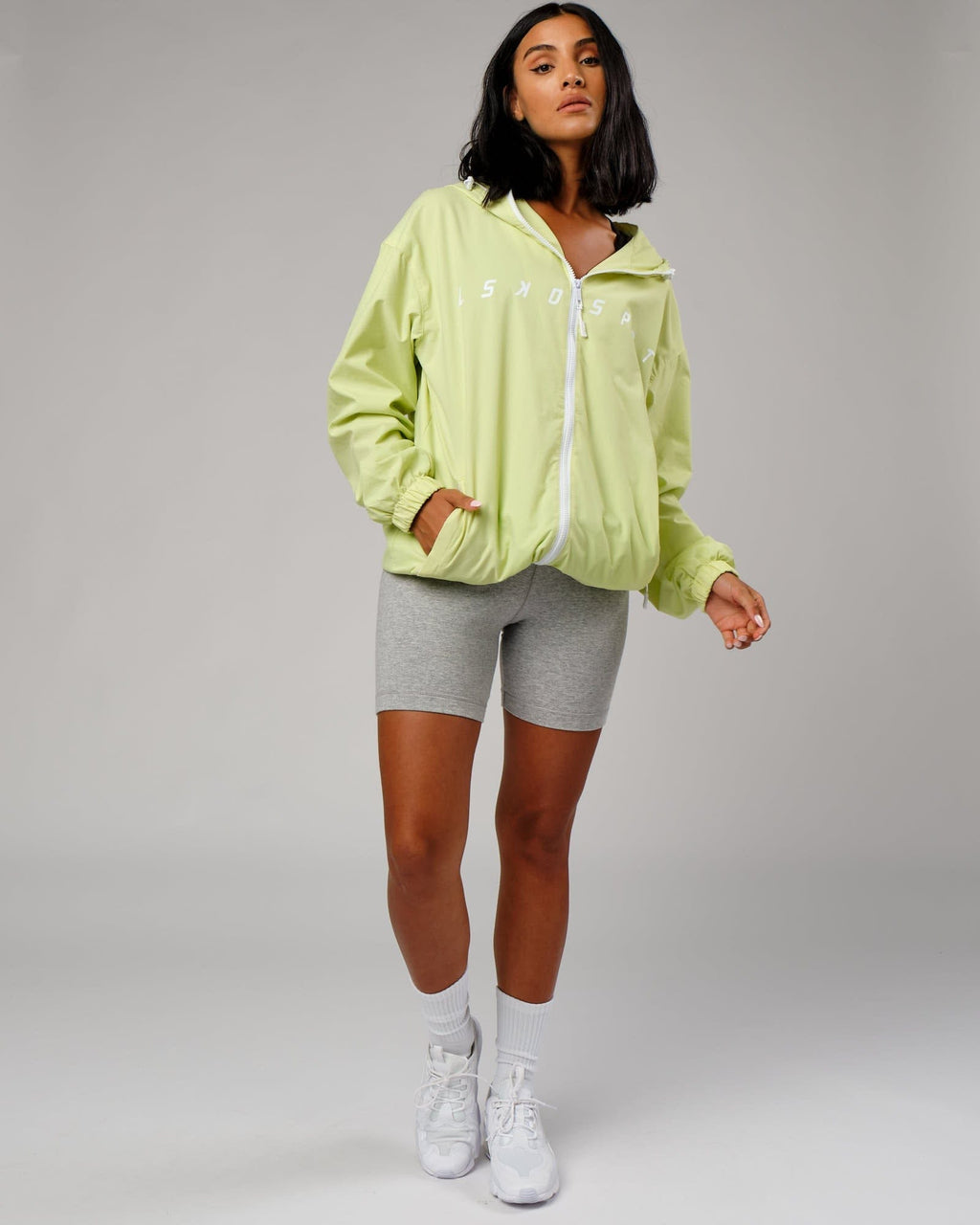 Model wearing Unisex Drill Track Jacket Oversize - Pastel Lime