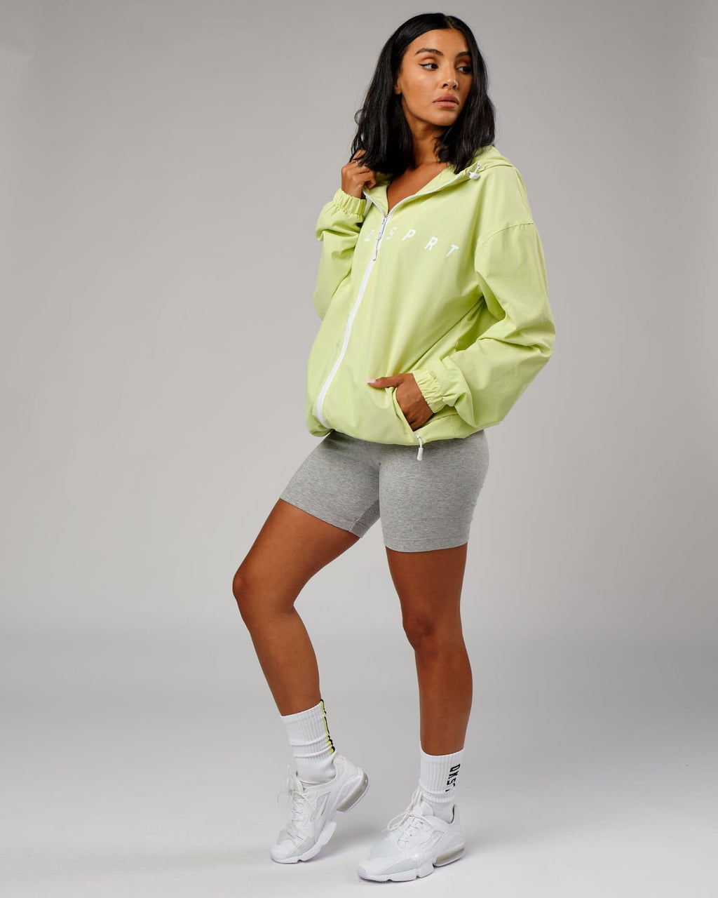 Model wearing Unisex Drill Track Jacket Oversize - Pastel Lime