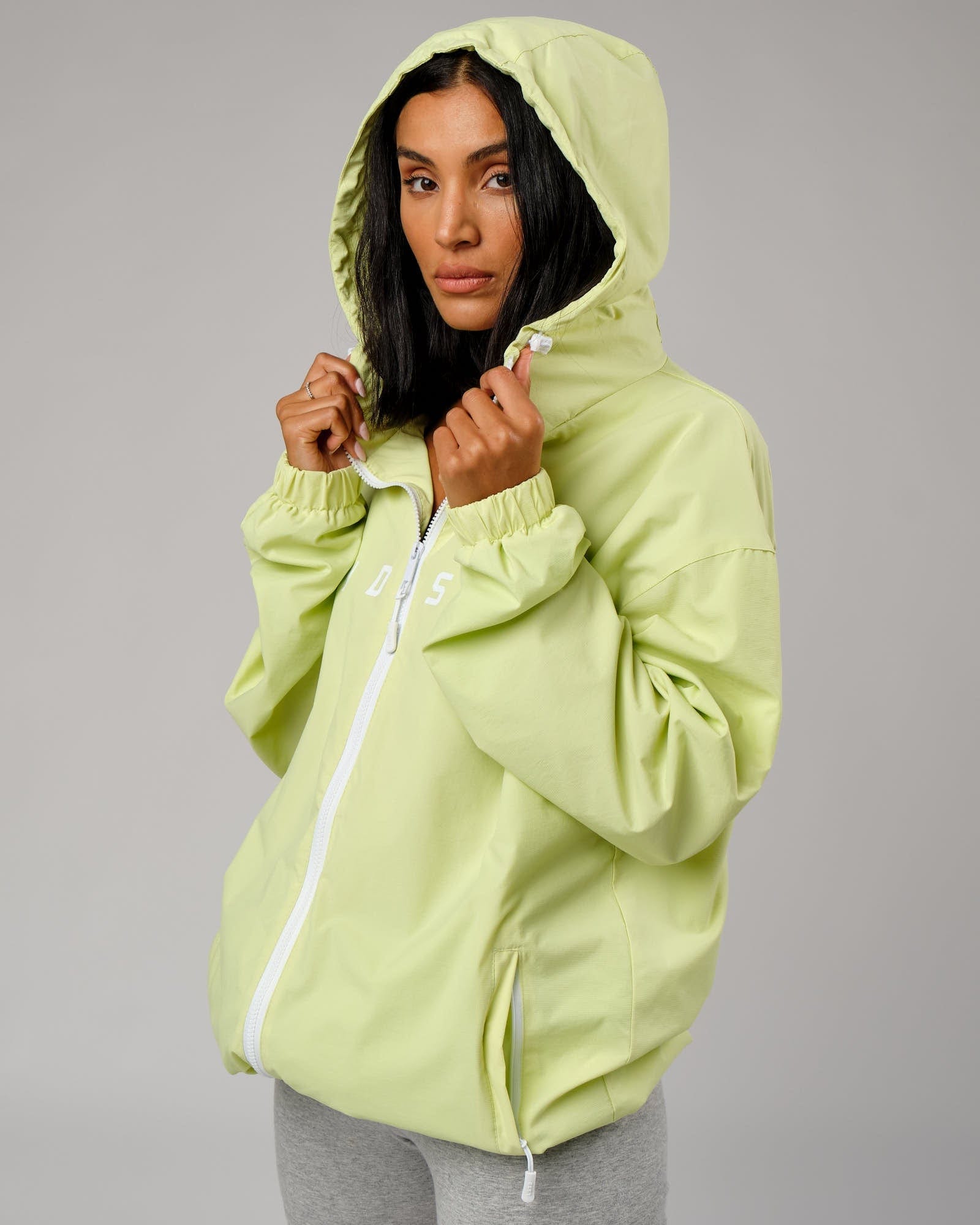 Model wearing Unisex Drill Track Jacket Oversize - Pastel Lime