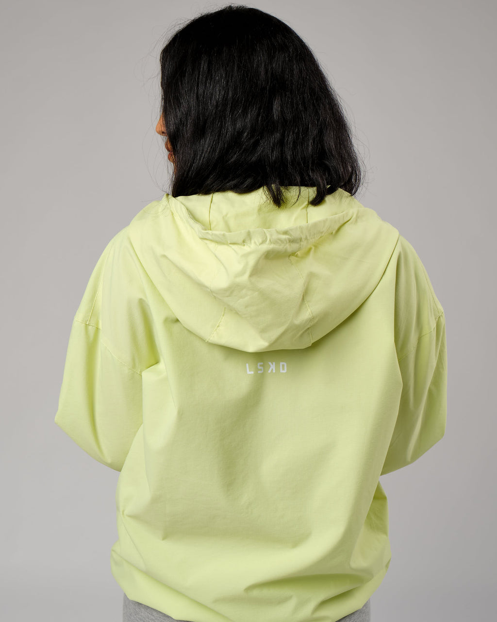 Model wearing Unisex Drill Track Jacket Oversize - Pastel Lime