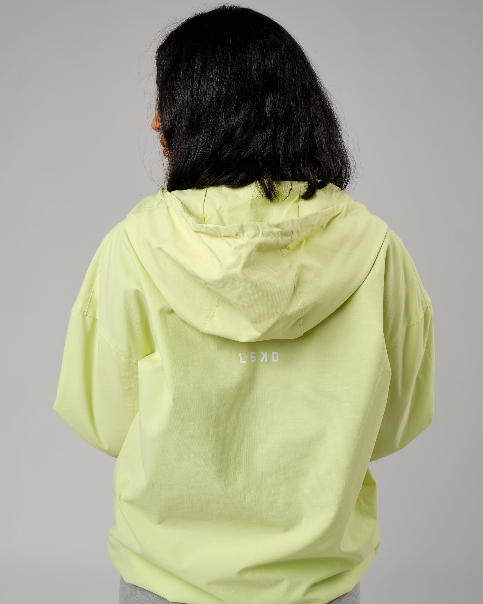 Model wearing Unisex Drill Track Jacket Oversize - Pastel Lime
