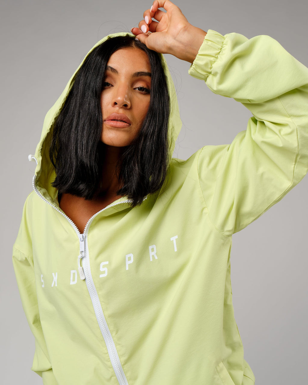 Model wearing Unisex Drill Track Jacket Oversize - Pastel Lime