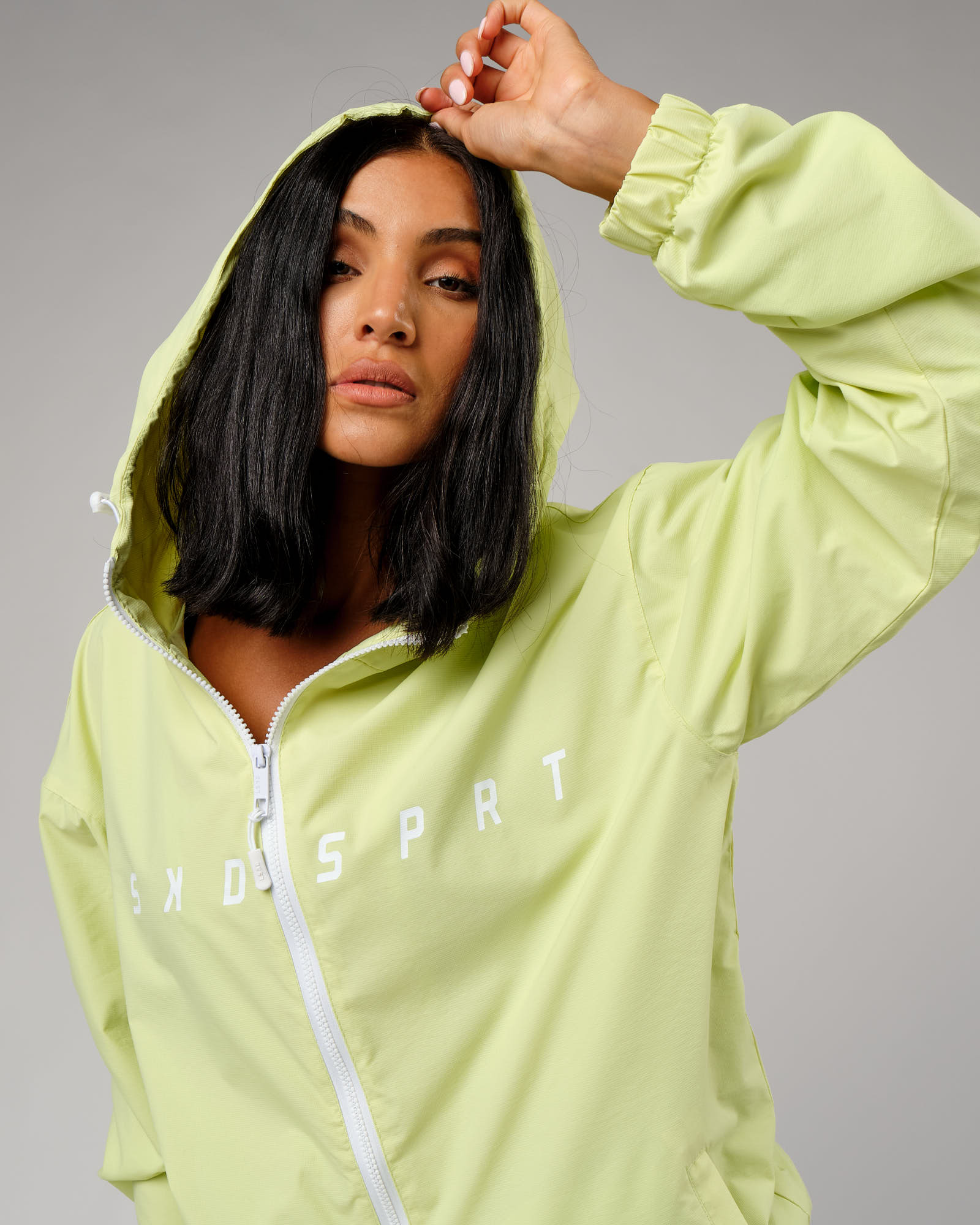 Model wearing Unisex Drill Track Jacket Oversize - Pastel Lime