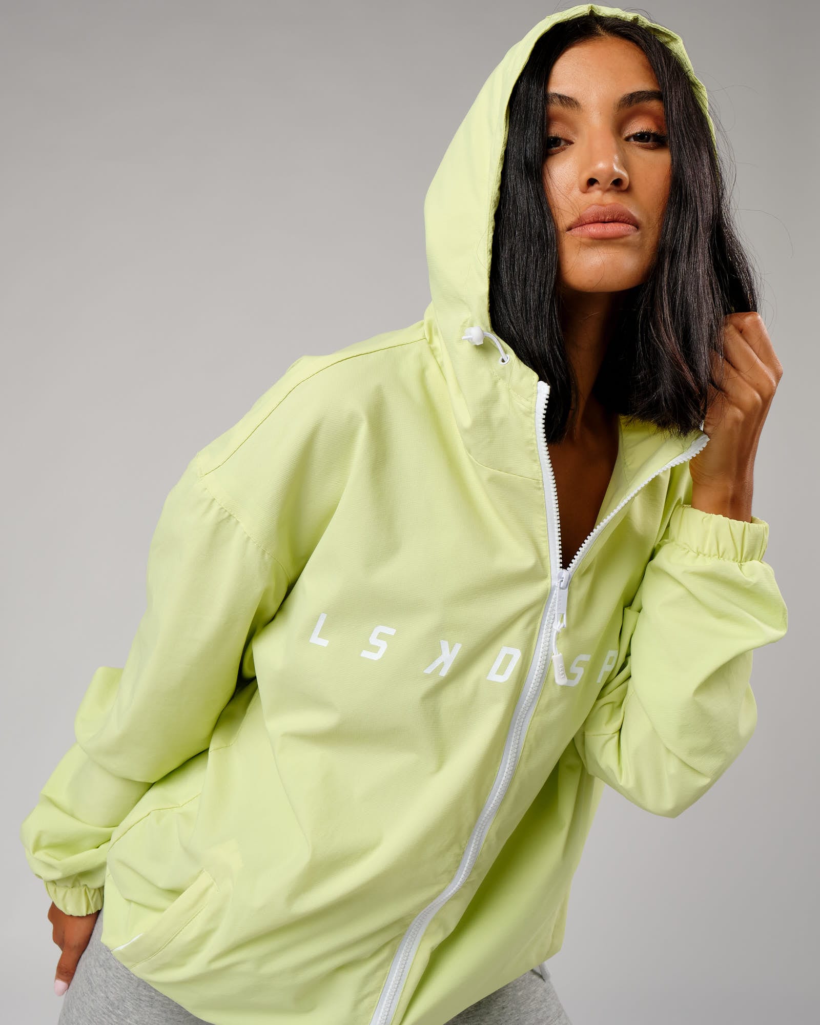 Model wearing Unisex Drill Track Jacket Oversize - Pastel Lime