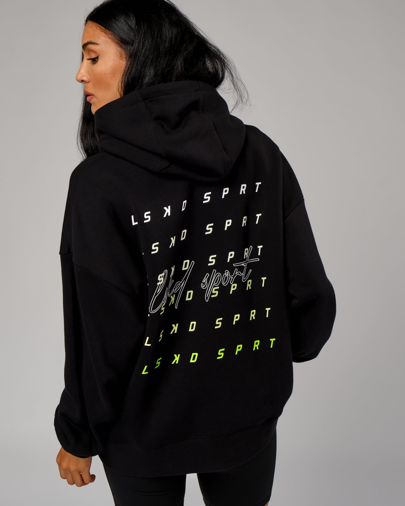 Model wearing Fixed Oversized Hoodie - Black-Fluro Lime