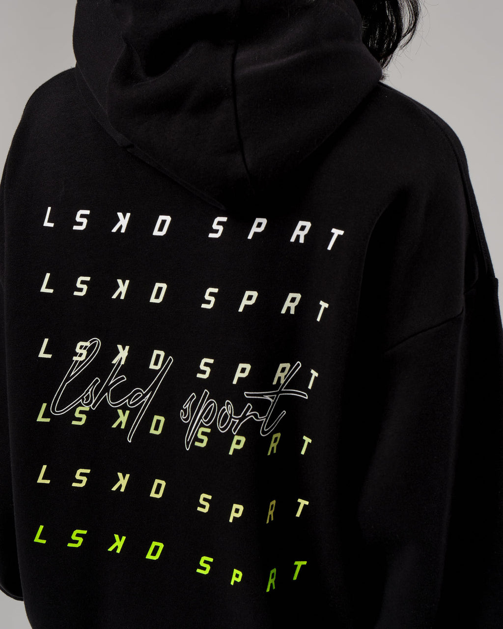 Model wearing Fixed Oversized Hoodie - Black-Fluro Lime