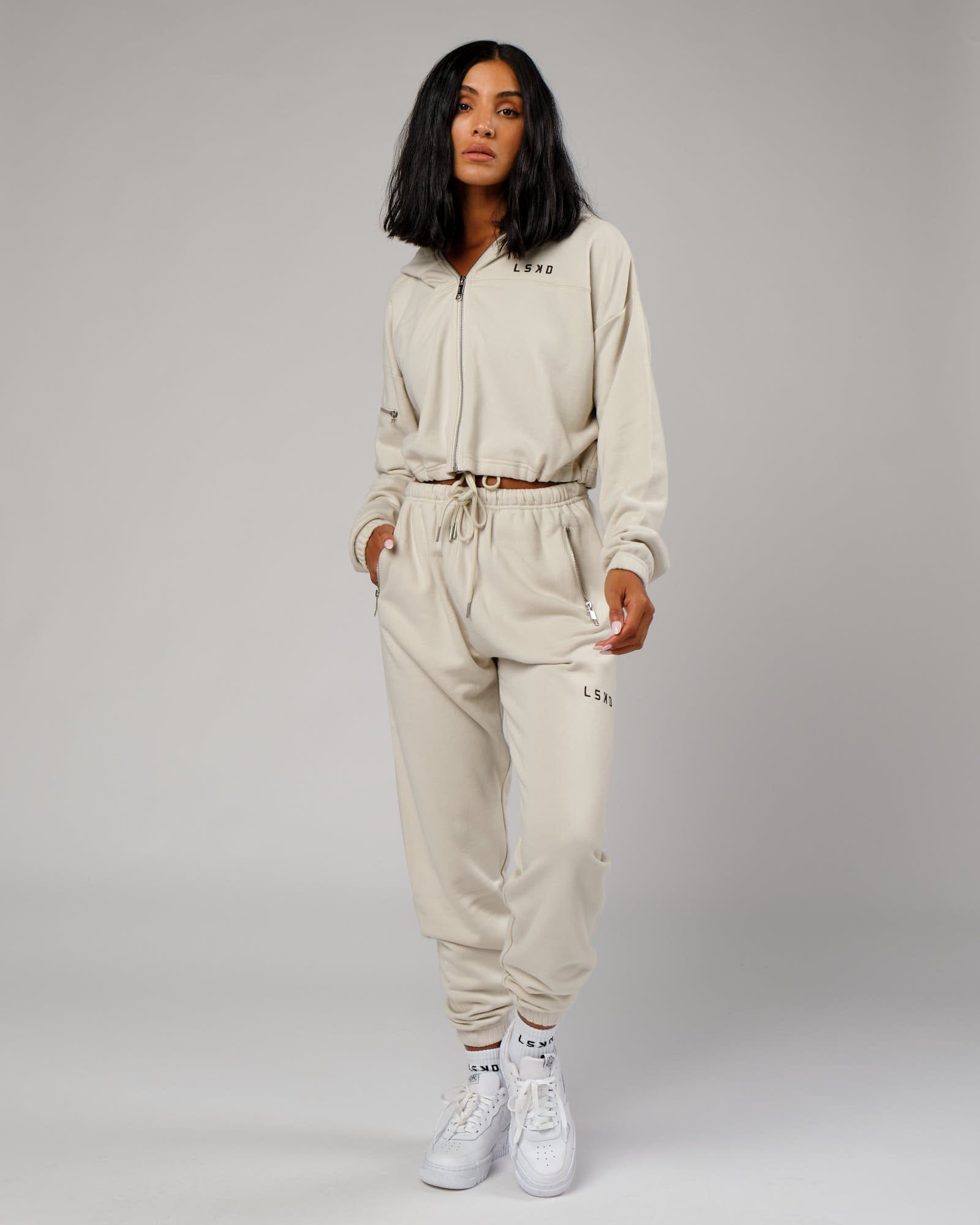 Model wearing Bridge Zip Through Hoodie - Bone