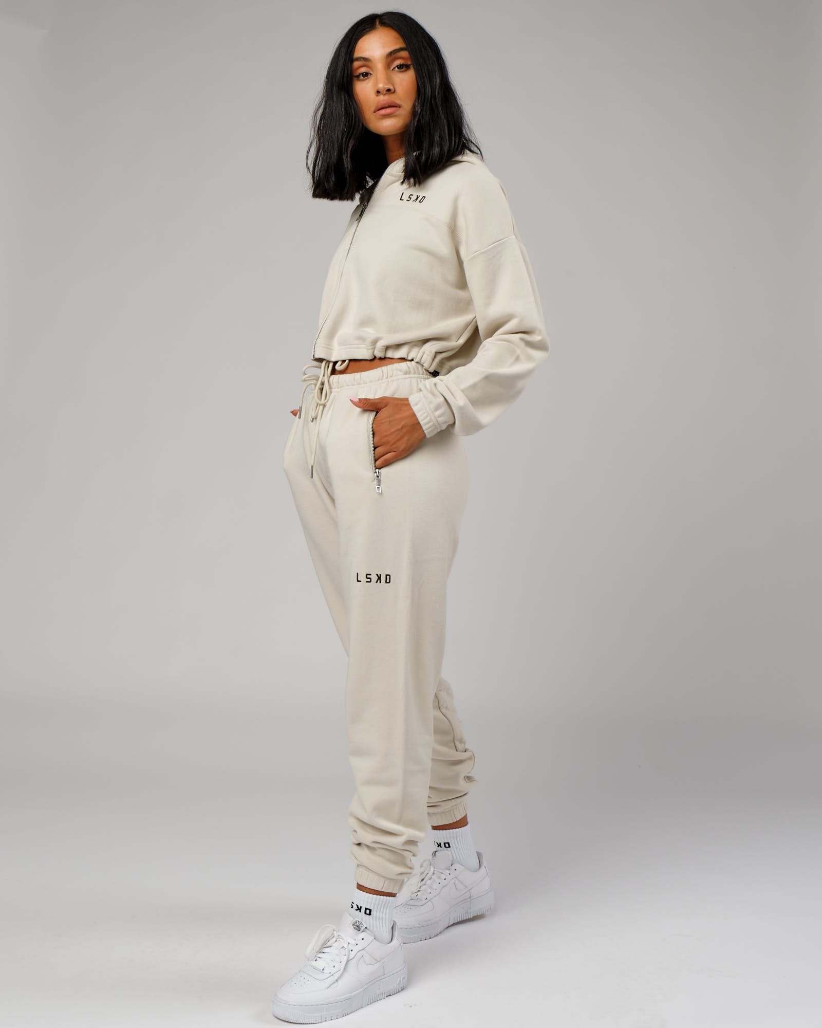 Model wearing Bridge Zip Through Hoodie - Bone