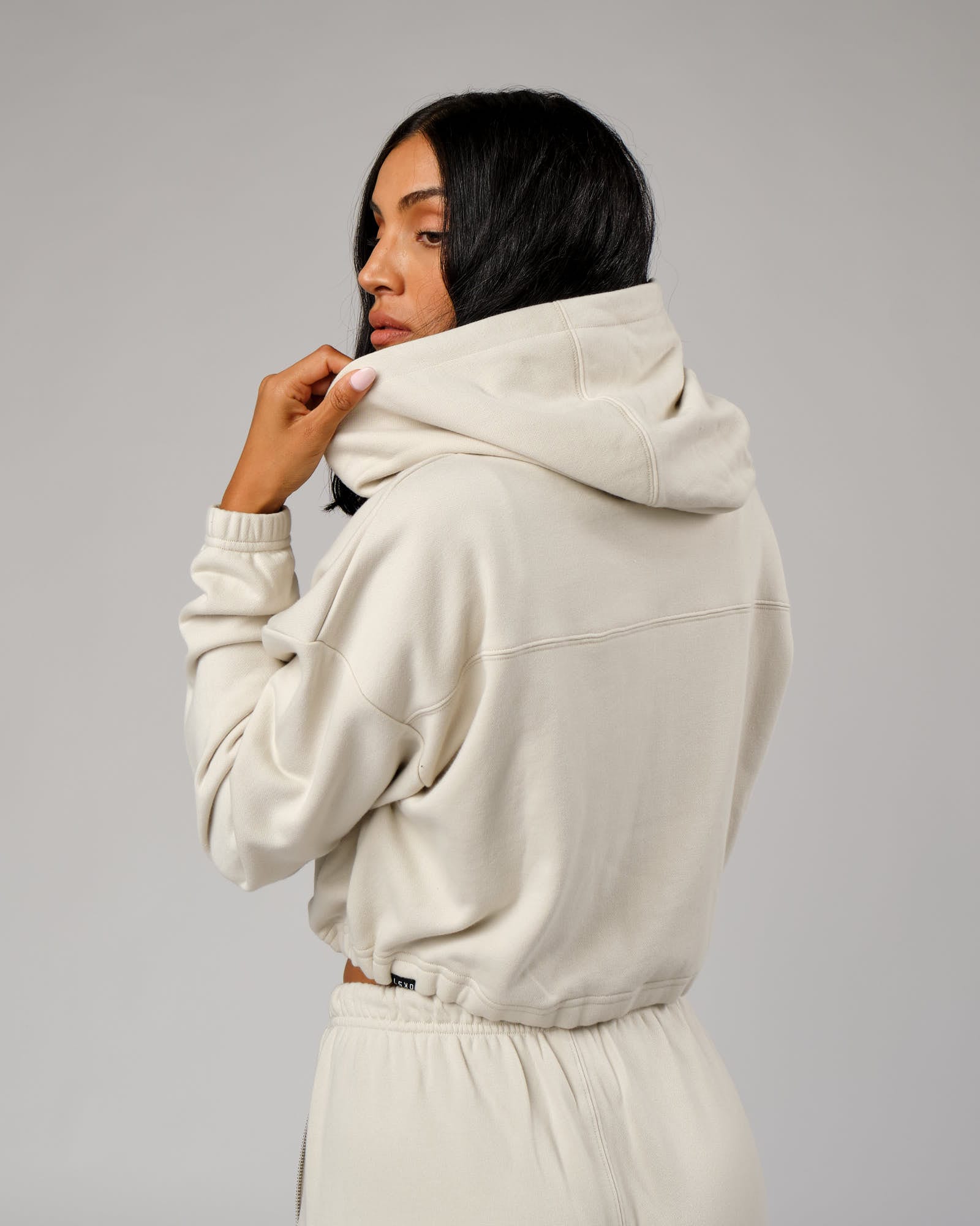 Model wearing Bridge Zip Through Hoodie - Bone