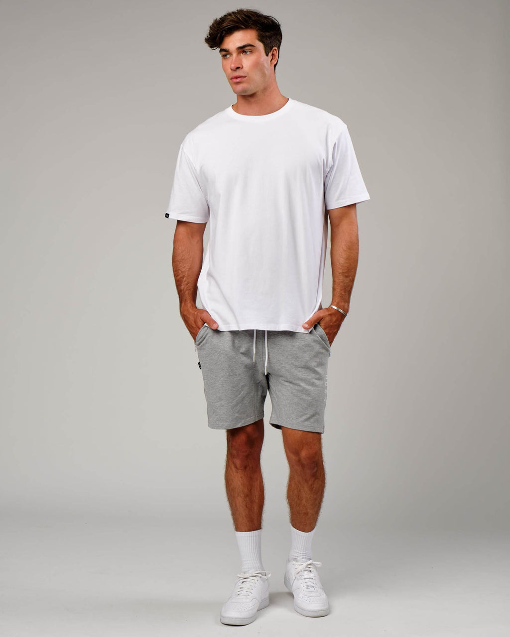 Model wearing Vitality Short - Lt Grey Marl