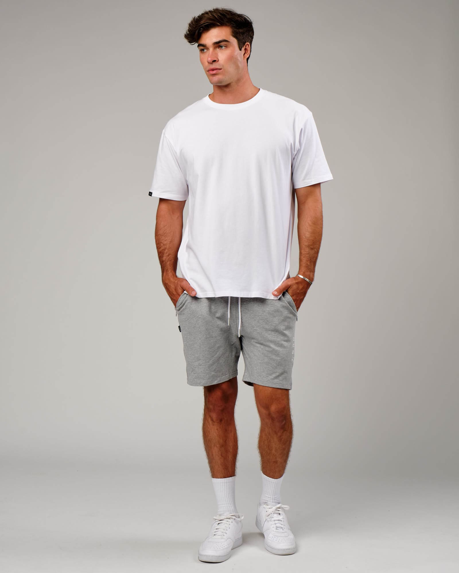 Model wearing Vitality Short - Lt Grey Marl