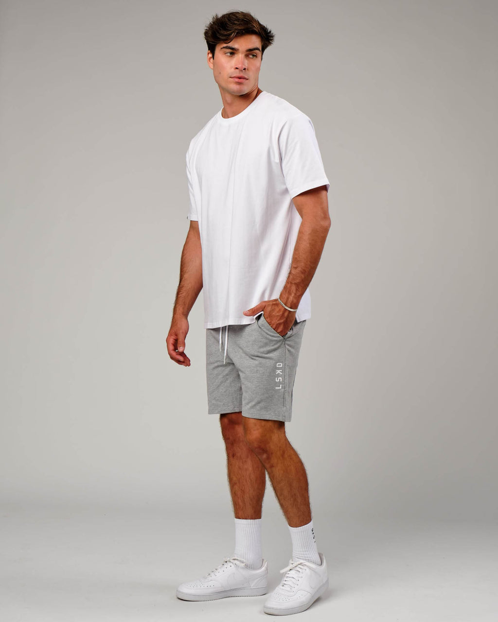 Model wearing Vitality Short - Lt Grey Marl