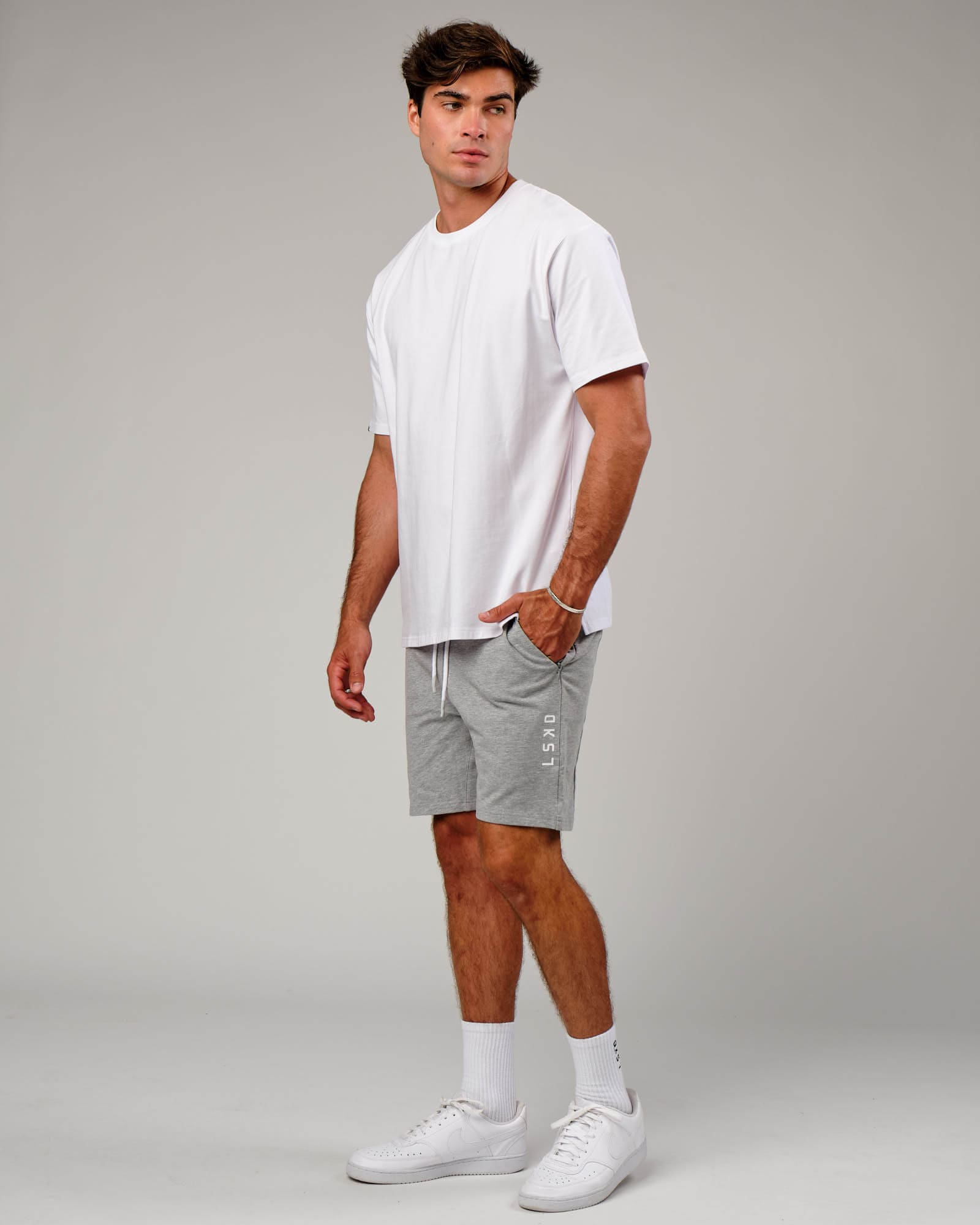 Model wearing Vitality Short - Lt Grey Marl