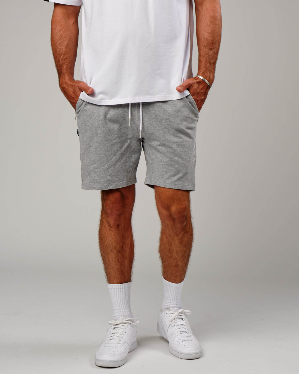 Model wearing Vitality Short - Lt Grey Marl