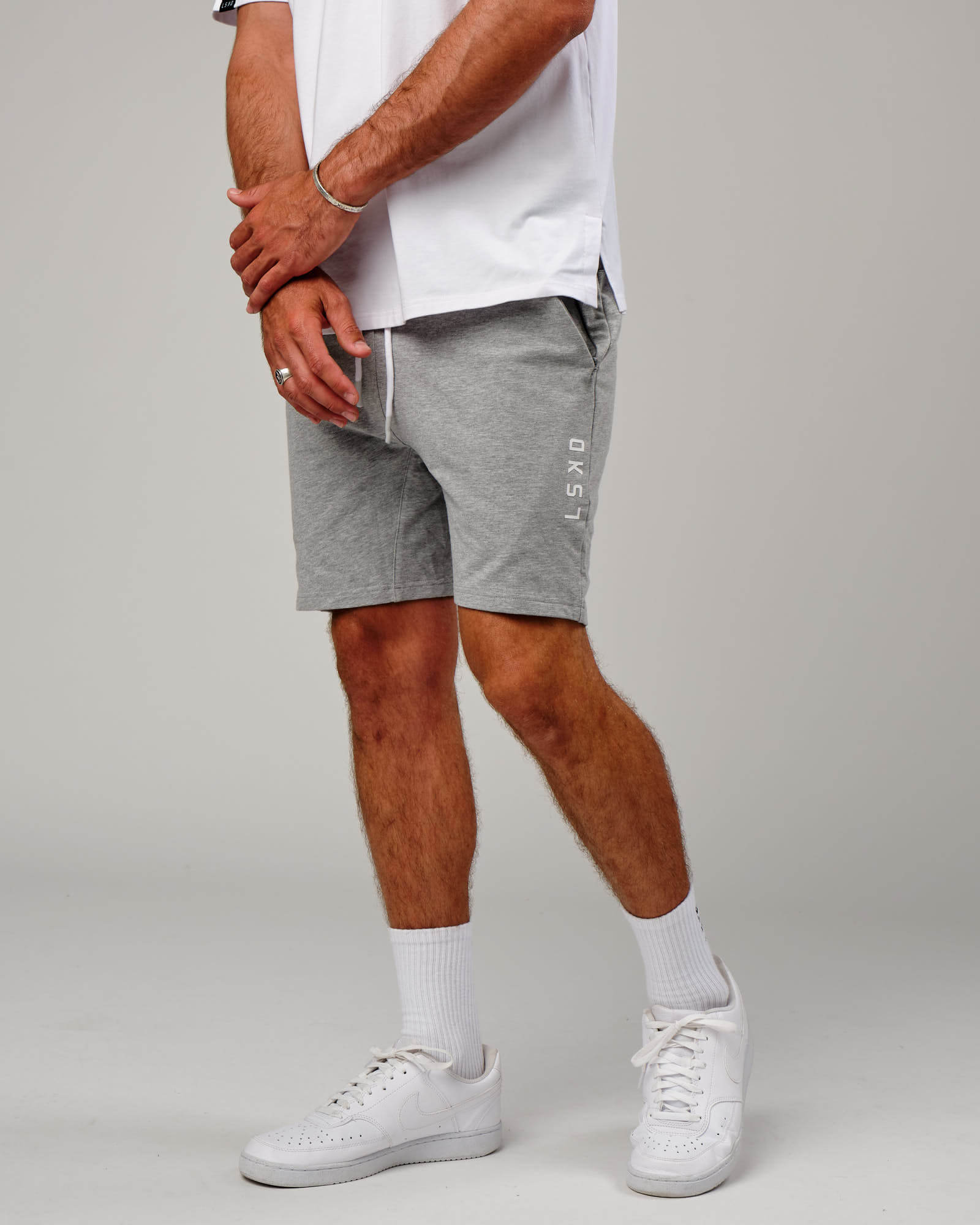 Model wearing Vitality Short - Lt Grey Marl