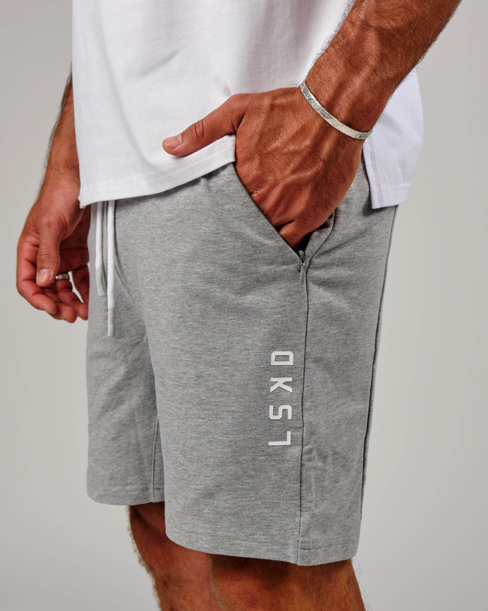 Model wearing Vitality Short - Lt Grey Marl
