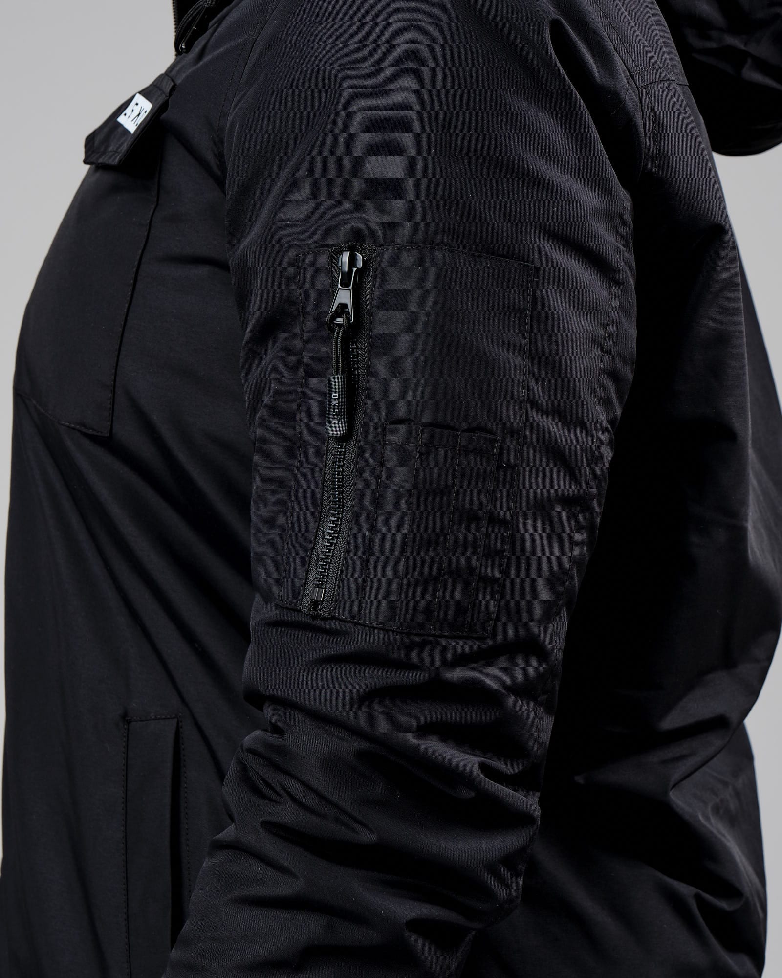 Model wearing Auxiliary Jacket 22 - Black