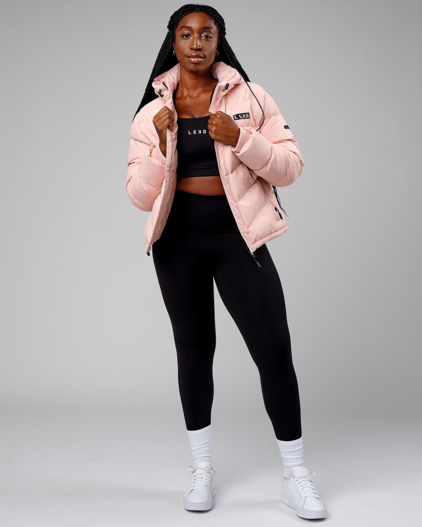 Model wearing Roasted Puffer Jacket 22 - Peach Whip