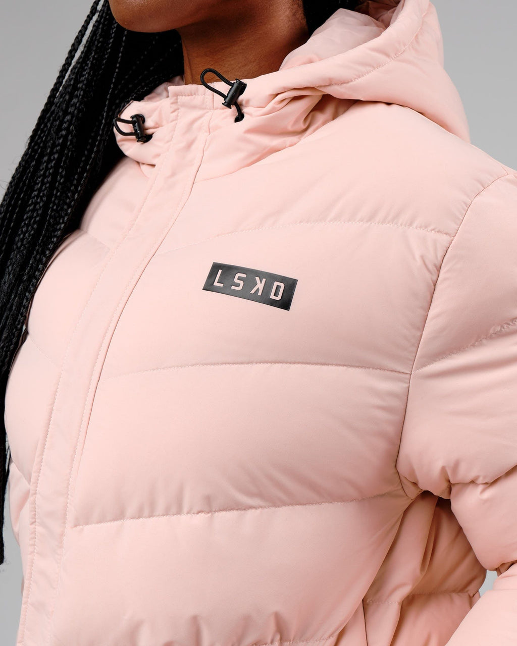 Model wearing Roasted Puffer Jacket 22 - Peach Whip