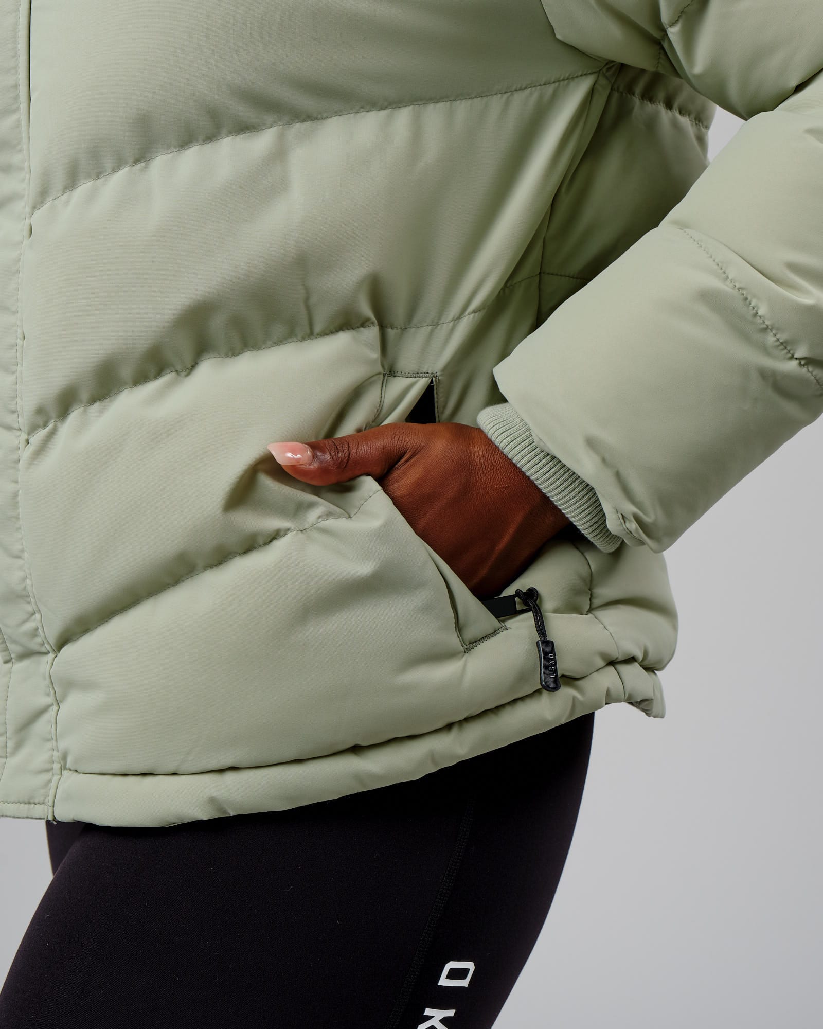 Model wearing Roasted Puffer Jacket 22 - Desert Sage